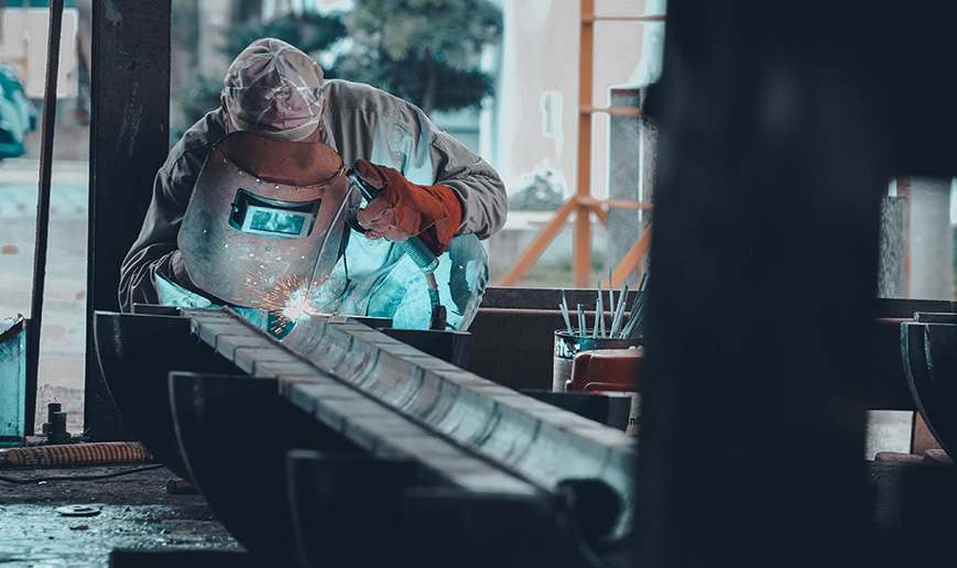 PMW worker on the production line