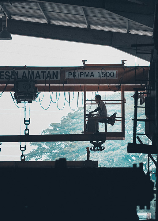 Silhouette of a PMW worker in the plant